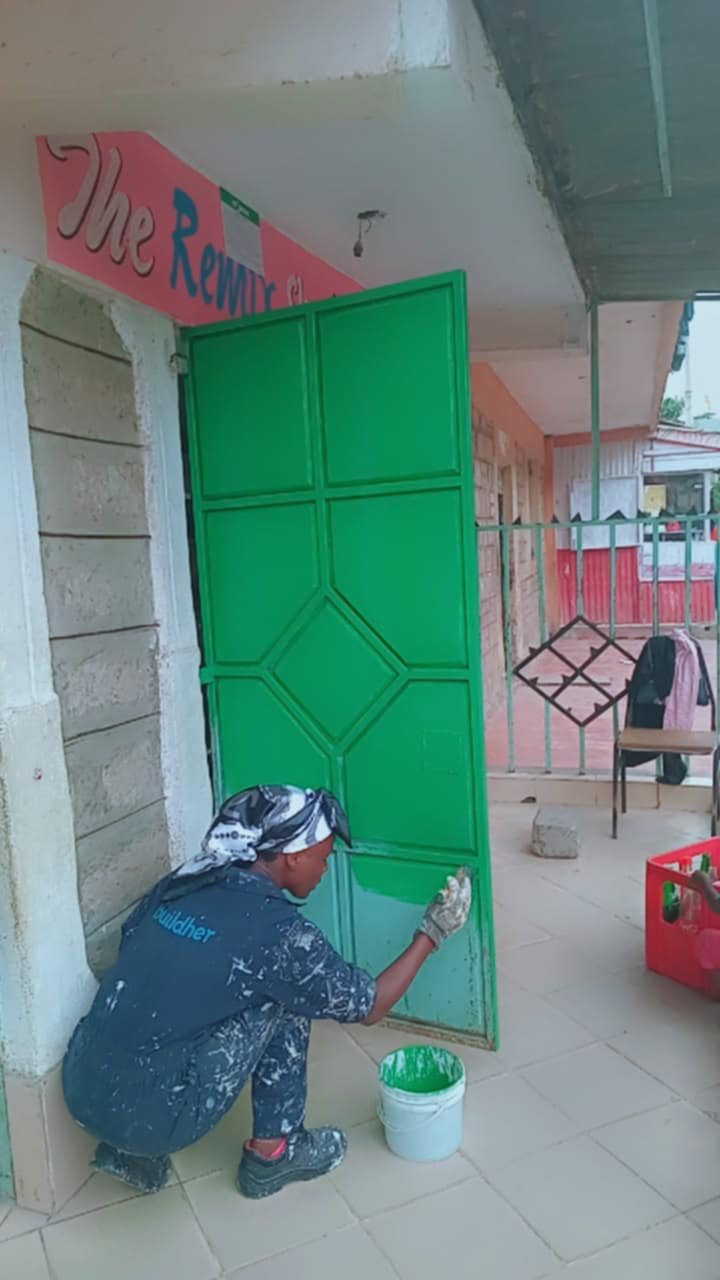 Emmah painting green door